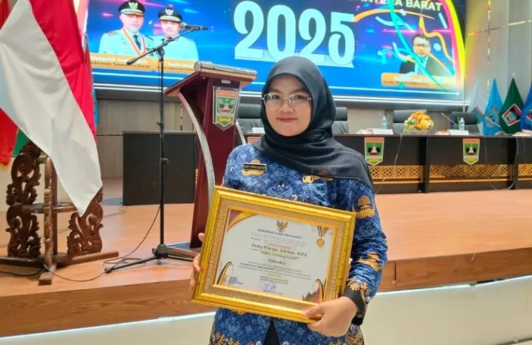Guru SMKN 1 Padang Laweh Raih Terbaik II Guru Dedikatif Sumbar