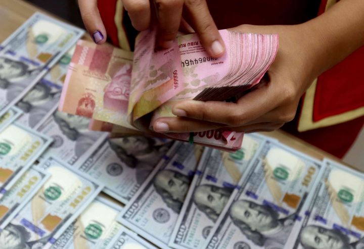 Rupiah Ditutup Menguat ke Rp18.068/USD, Konflik AS-Iran dan Inflasi AS Jadi Pemicu