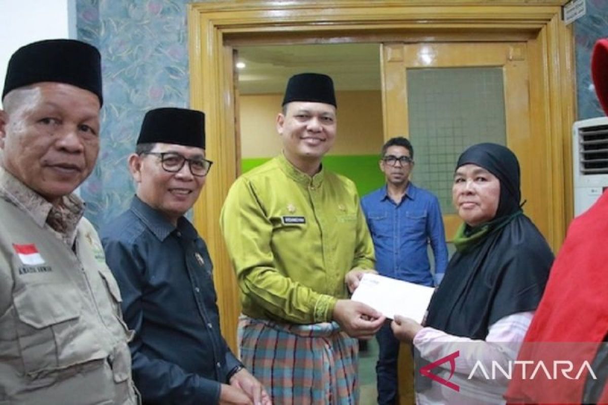 HUT ke-26 Haluan Riau di Pekanbaru: Pemkot Beri Apresiasi, Puluhan Anak Yatim Terima Sembako dari Baznas