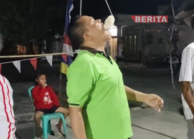 Sekretaris Komisi A DPRD Pati Kastomo Ikut Lomba Makan Kerupuk di Kudur Winong, Tekankan Gotong Royong Jaga Kemerdekaan