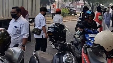 Bapenda Palangka Raya Buka Suara soal Razia Pajak di Tengah Kabut Asap: 1.000 Masker Dibagikan ke Pengendara