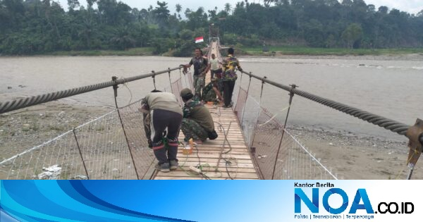Satgas TNI Kodim 0108/Agara dan Warga Kumbang Jaya Rampungkan Pengecatan Jembatan Gantung Perintis Garuda, Progres Capai 97 Persen