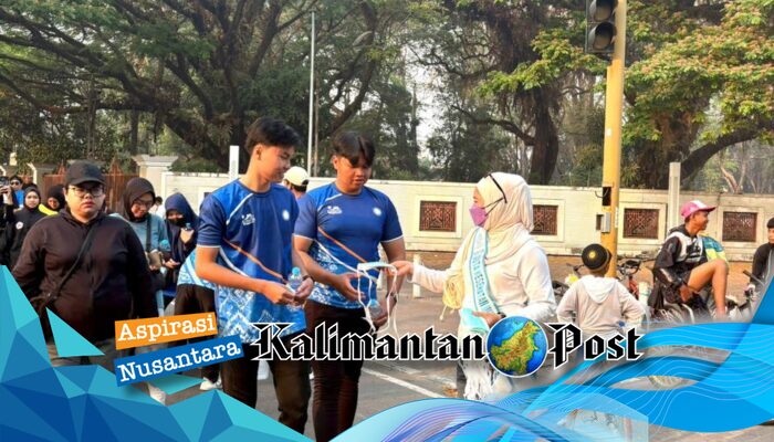 Duta dan Pemuda Inspiratif Kalsel Bagikan 1.000 Masker di Banjarmasin Cegah ISPA Akibat Kabut Asap