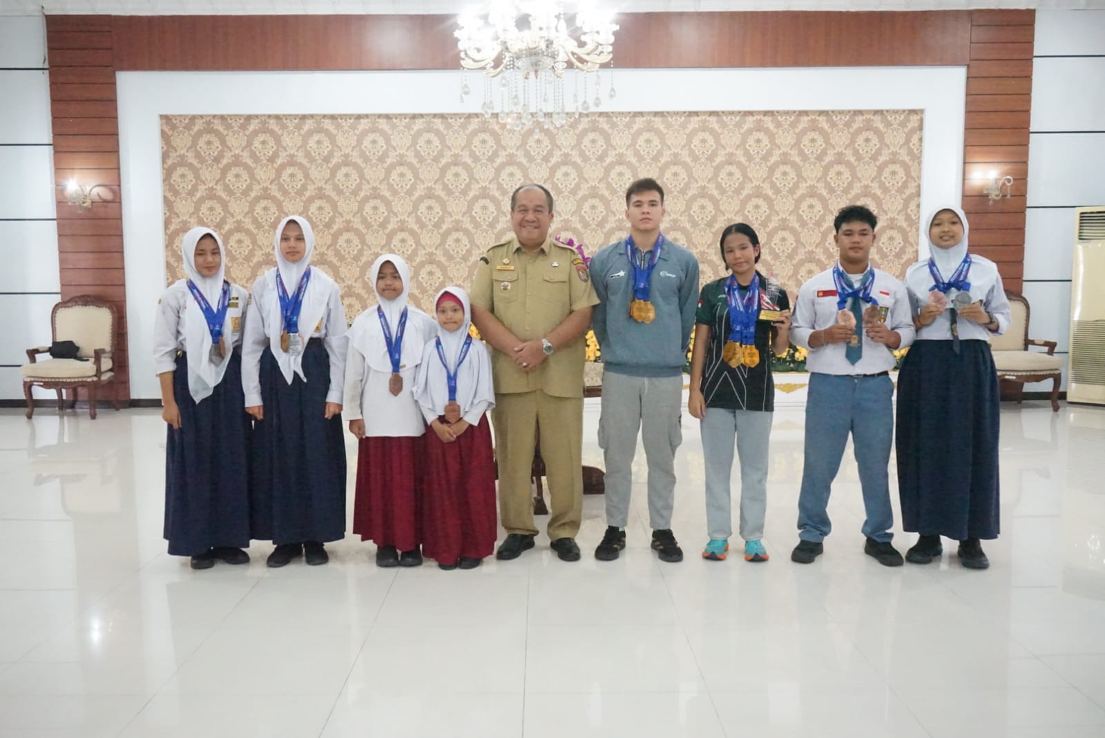 Bupati Asahan Terima Atlet Renang Peraih 22 Medali Piala Kemerdekaan 2026