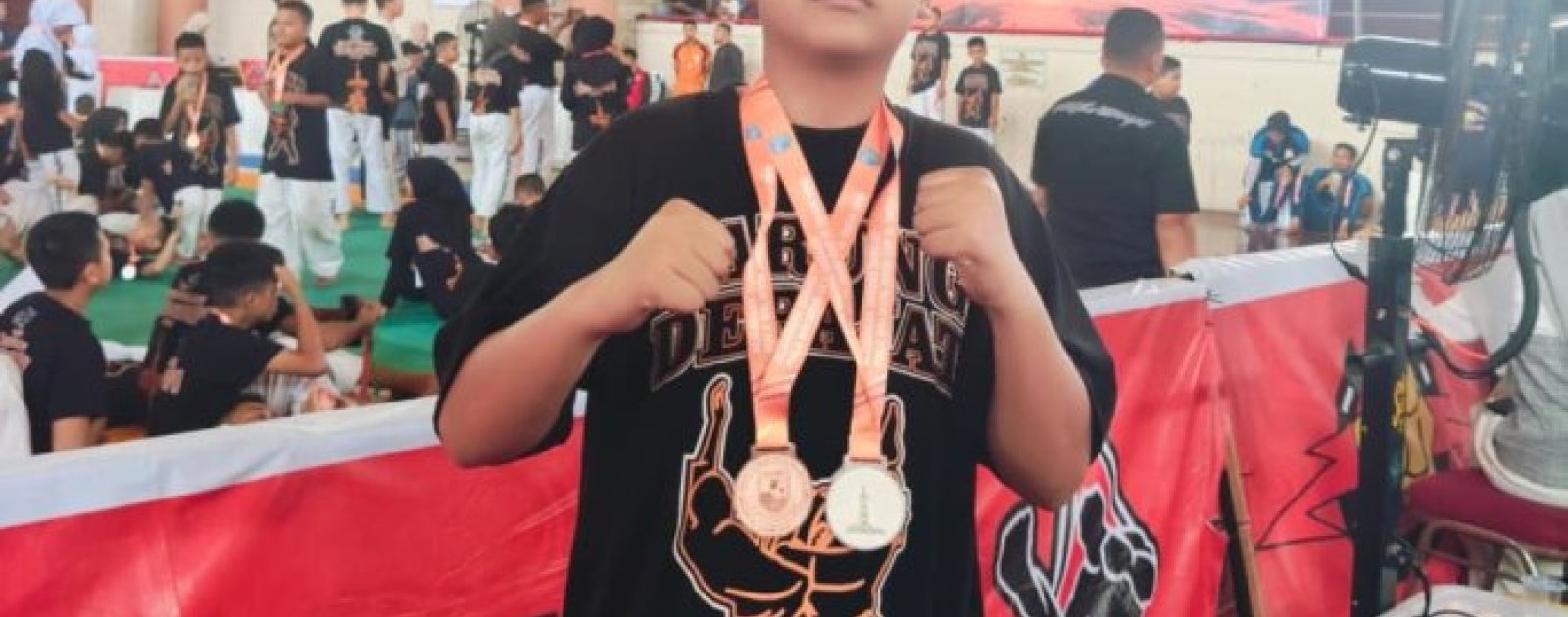 Pelajar MTsN 2 Kota Jambi M. Abidzar Hernawan Raih Juara 3 Tarung Bebas di Debut Wali Kota Cup