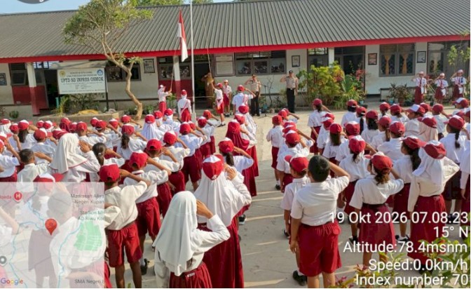 Polda NTT Masuk Sekolah Lewat Program Polisi Hadir, Tanamkan Nilai Kebangsaan di SDI Osmok Kupang