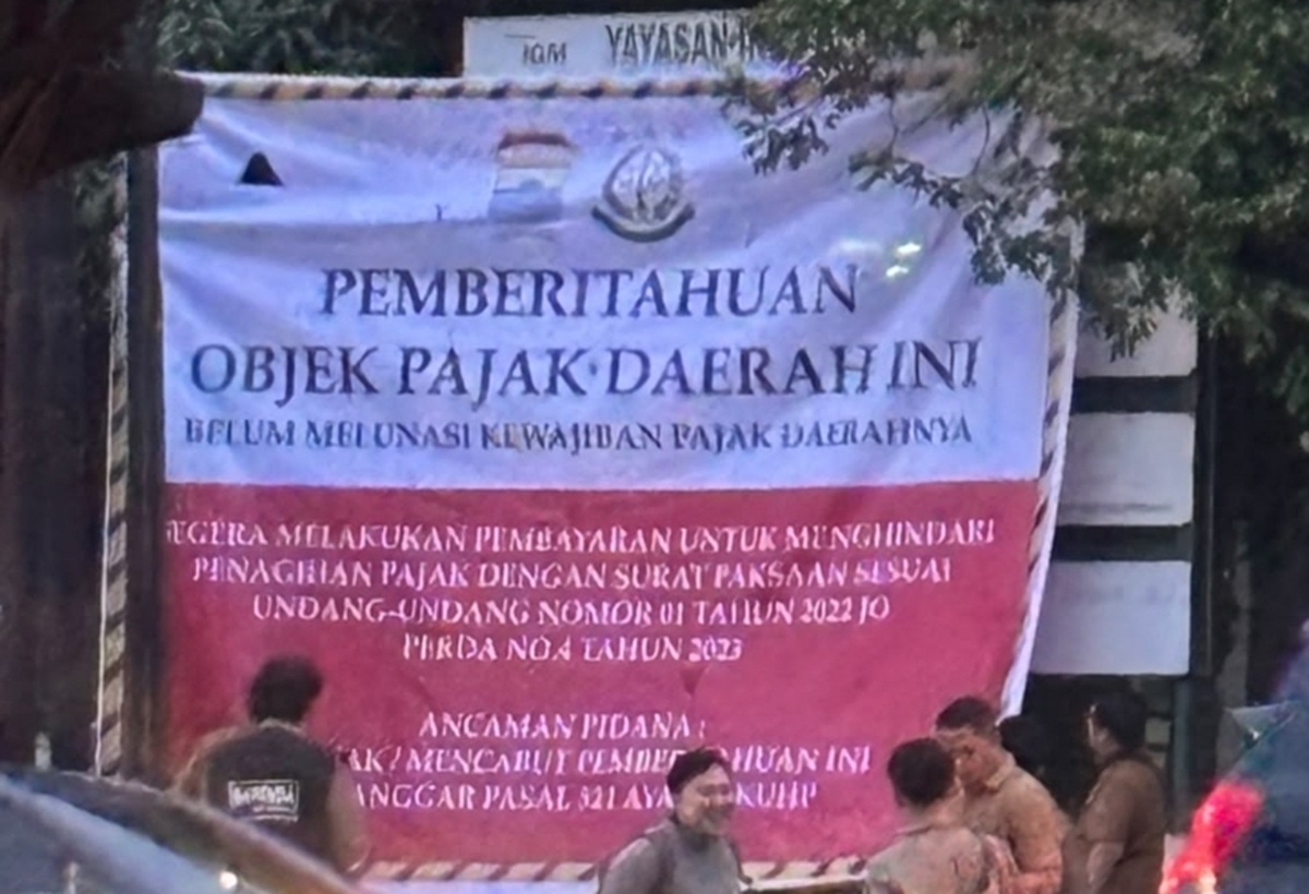 Bapenda Palembang Pasang Spanduk Peringatan di Universitas dan Sekolah IGM, Tunggakan PBB-P2 Capai Rp2,33 Miliar