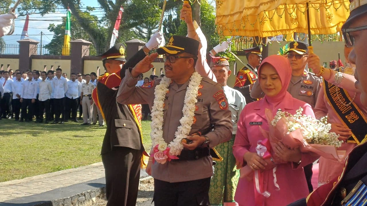 AKBP Abdul Kholik Resmi Jabat Kapolres Kotamobagu Gantikan AKBP Irwanto, Tradisi Parade Warnai Serah Terima