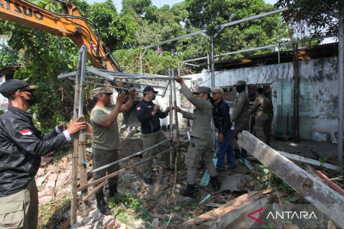 Satpol PP Diminta Tak Hanya Tegakkan Perda, Kemendagri Dorong Aksi Sosial hingga Bantu Anak Menyeberang Jalan