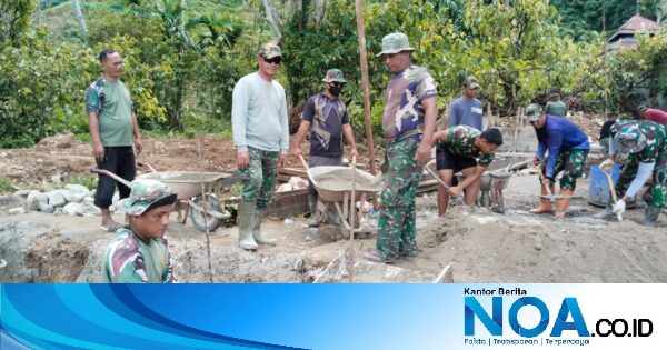Babinsa Kodim 0108/Aceh Tenggara Gotong Royong Pasang Tiang Pylon Jembatan Gantung 130 Meter di Desa Lawe Ger-Ger