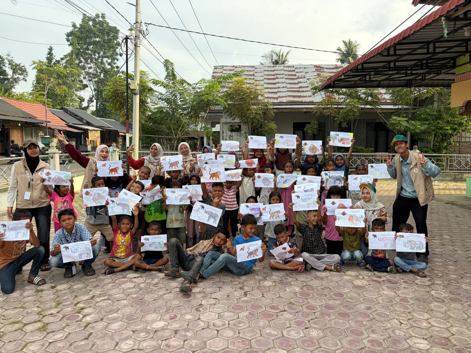 Lewat Lomba Mewarnai, Mahasiswa KKN USK Kenalkan Gajah hingga Harimau Sumatra ke Anak-Anak di Pidie Jaya