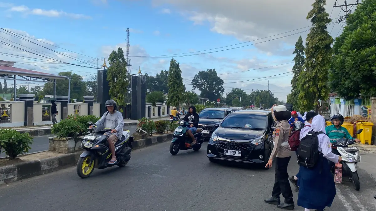 Satlantas Polres Kotamobagu Terjunkan Personel di Depan Sekolah saat Strong Point Pagi, Fokus Kawasan Rawan Macet
